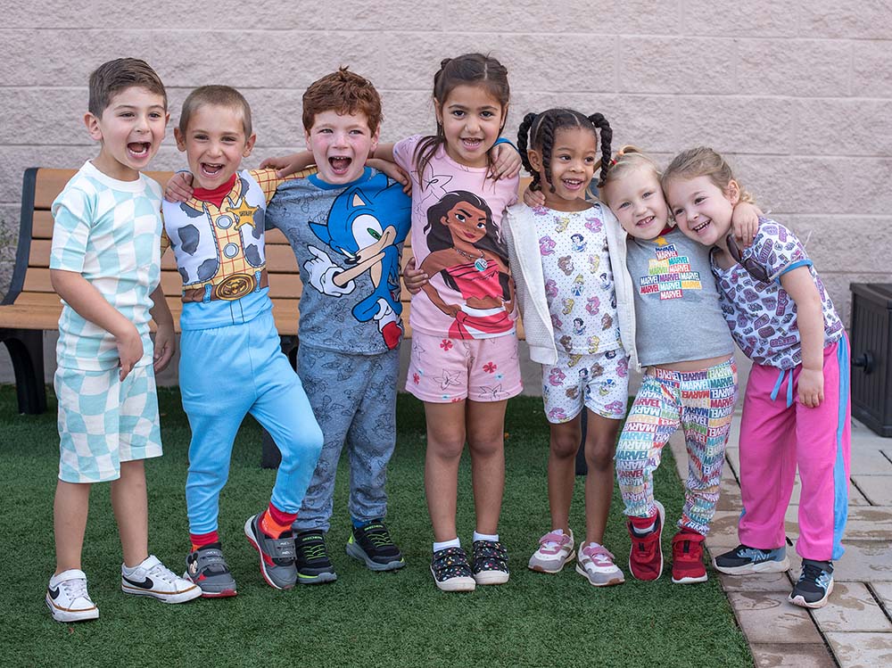 Image of preschool teacher and students